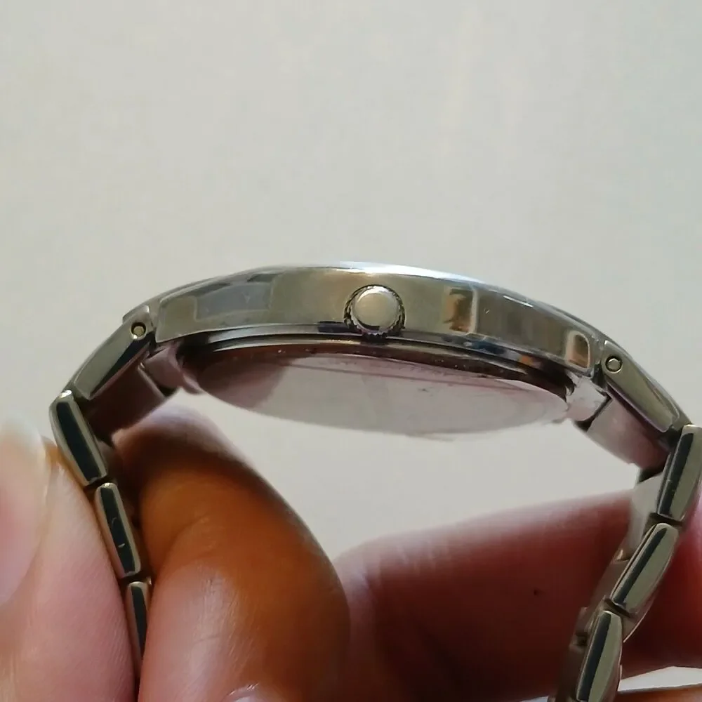 Kenneth Cole New York KC4381 Stainless Steel Women Watch Gray Textured Dial 31mm
